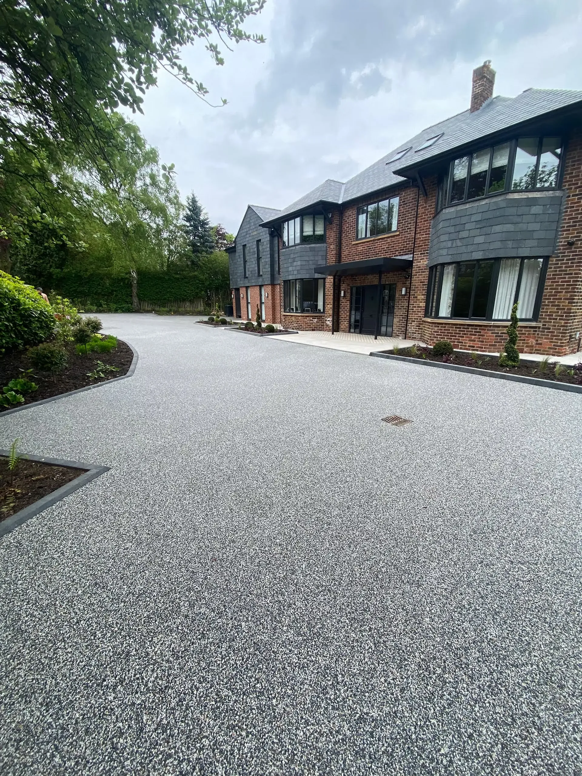 Large Grey Resin Driveway Installation In Leeds